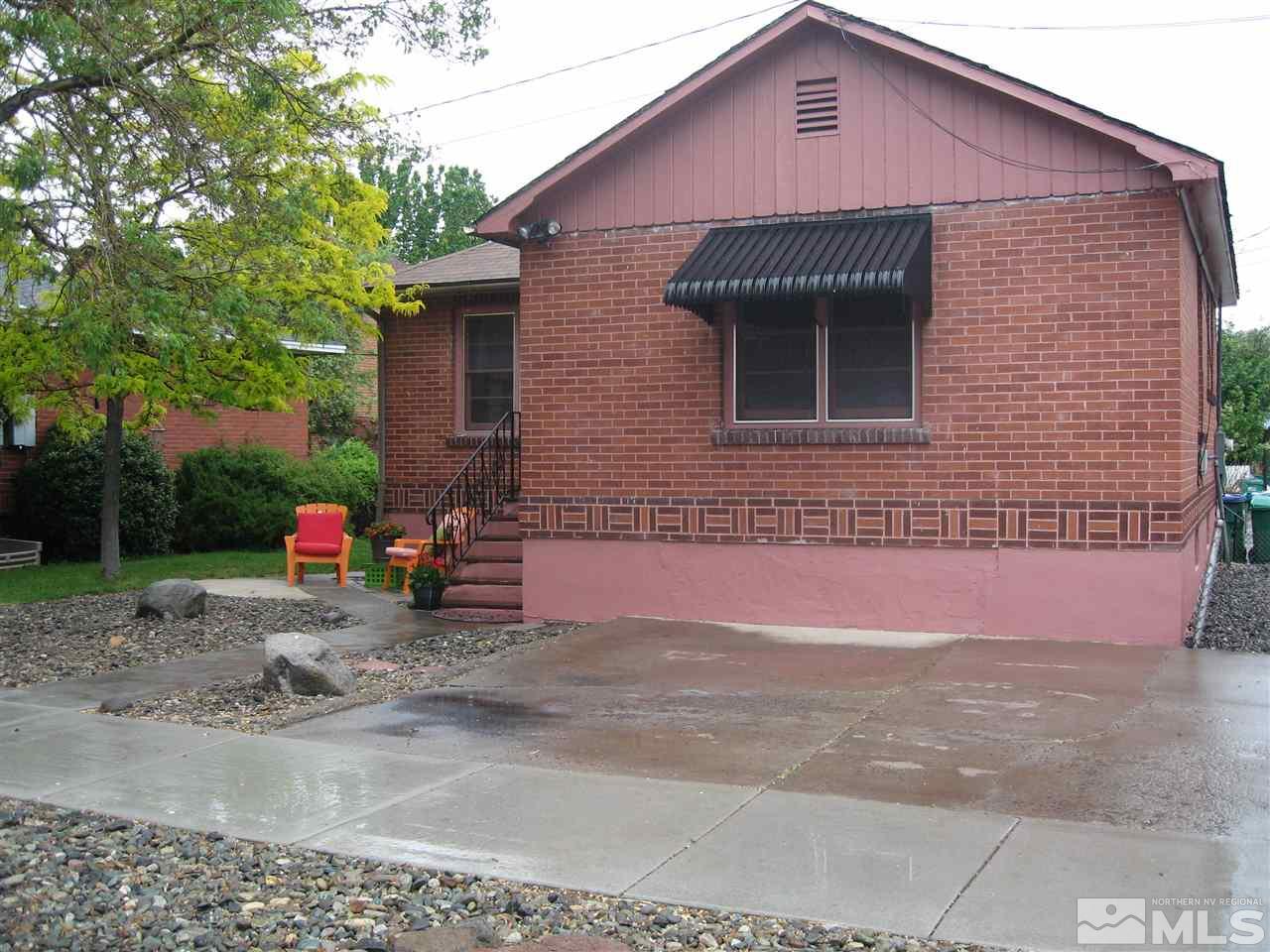 1220 Forest Street Reno, NV 89509 - Photo 24 of 25 a front view of a house with a garage