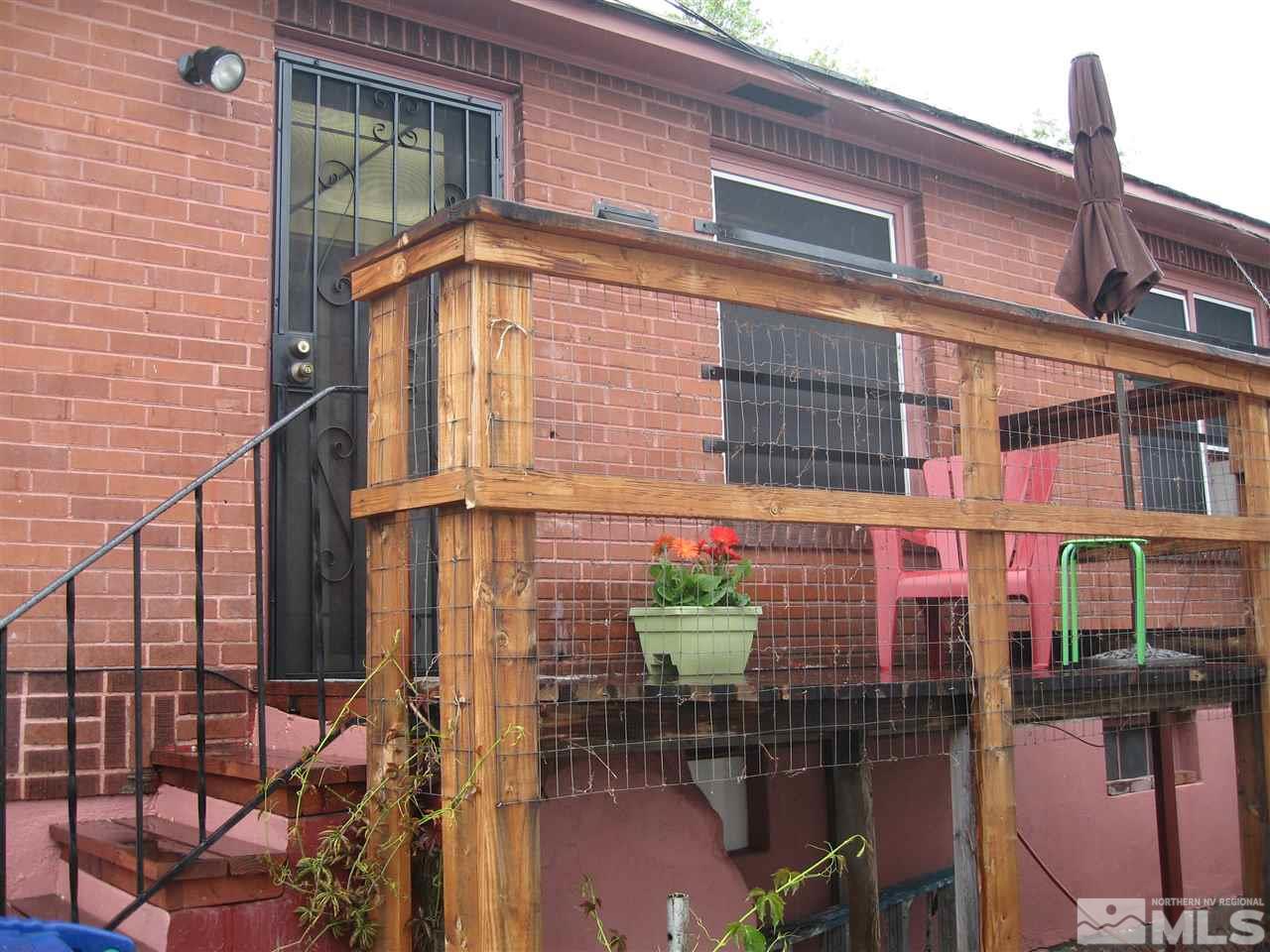 1220 Forest Street Reno, NV 89509 - Photo 3 of 25 a front view of a building with glass windows
