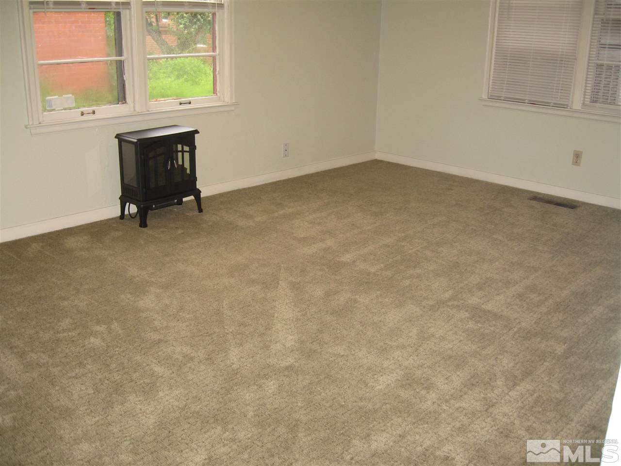 1220 Forest Street Reno, NV 89509 - Photo 6 of 25 an empty room with a window