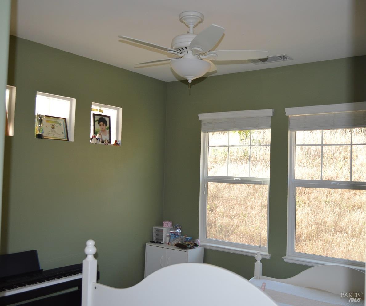 36 Rowe Ranch Drive Novato, CA 94949 - Photo 11 of 12 a bathroom with a window a sink and a toilet