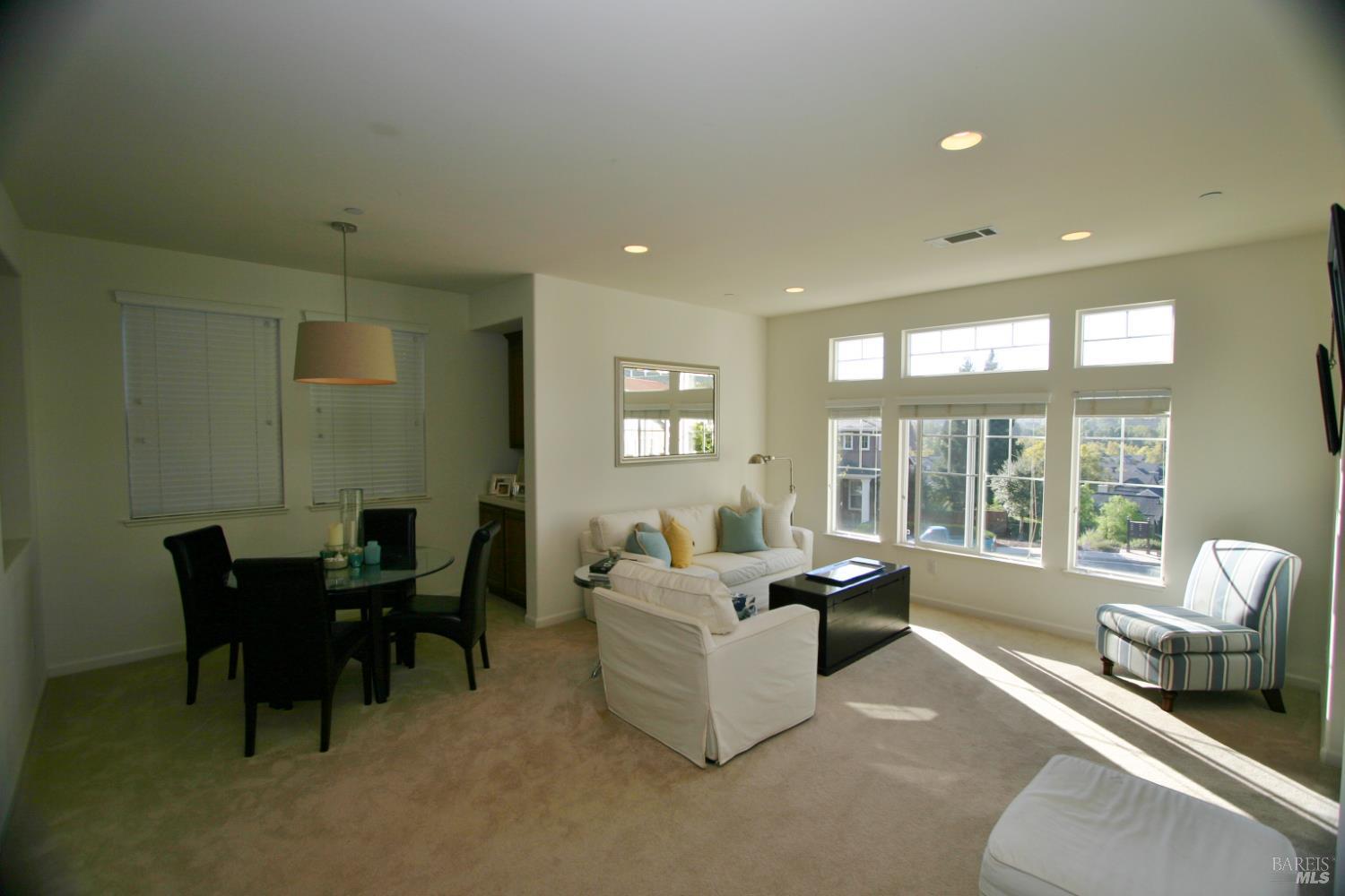 36 Rowe Ranch Drive Novato, CA 94949 - Photo 4 of 12 a living room with furniture and floor to ceiling windows