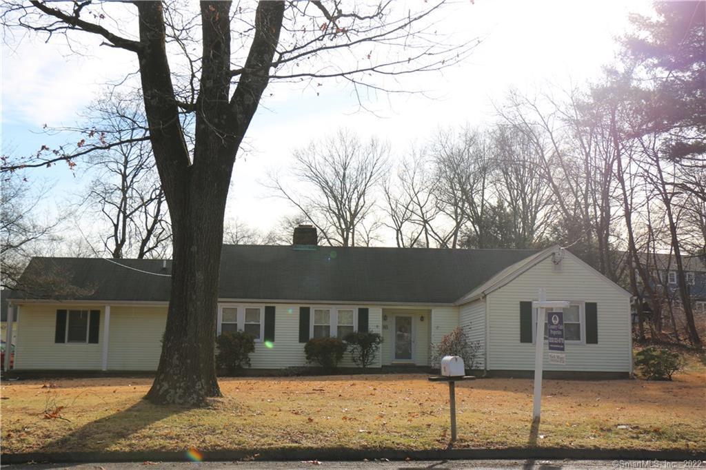 83 Wire Mill Road Stamford, CT 06902 - Photo 1 of 1 a front view of a house with garage