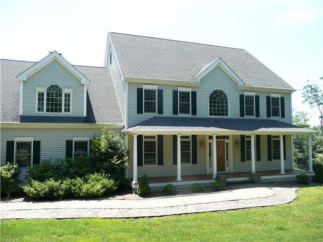 11 Taylor Ridge Road Clinton, CT 06413 - Photo 1 of 1 a front view of a house with a yard