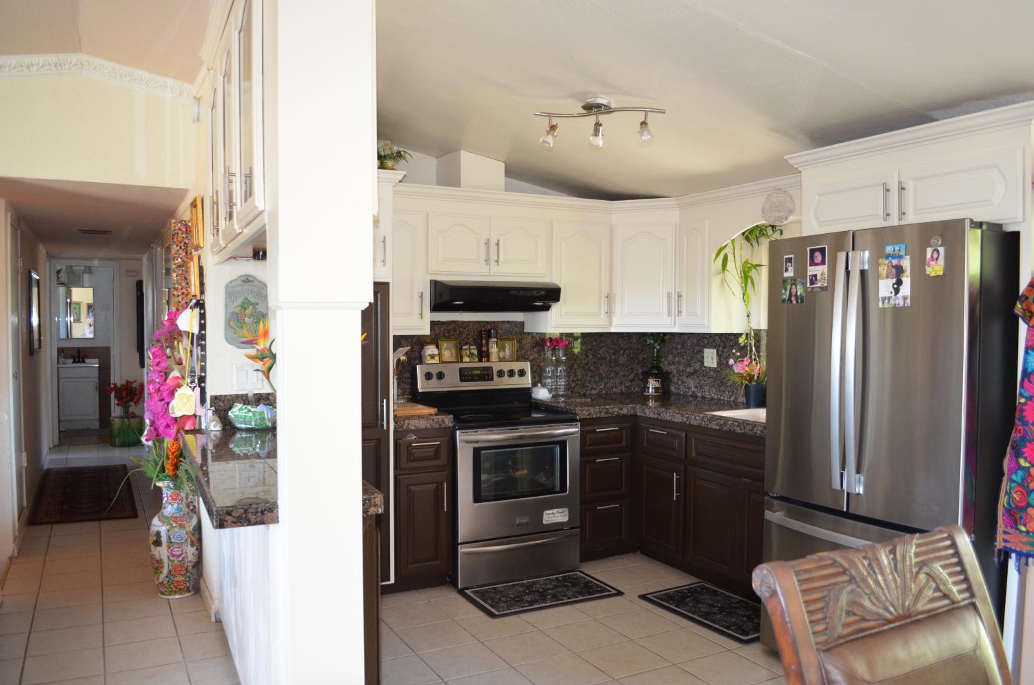 208 Appian Way Union City, CA 94587 - Photo 22 of 38 a kitchen with stainless steel appliances granite countertop a refrigerator and a stove
