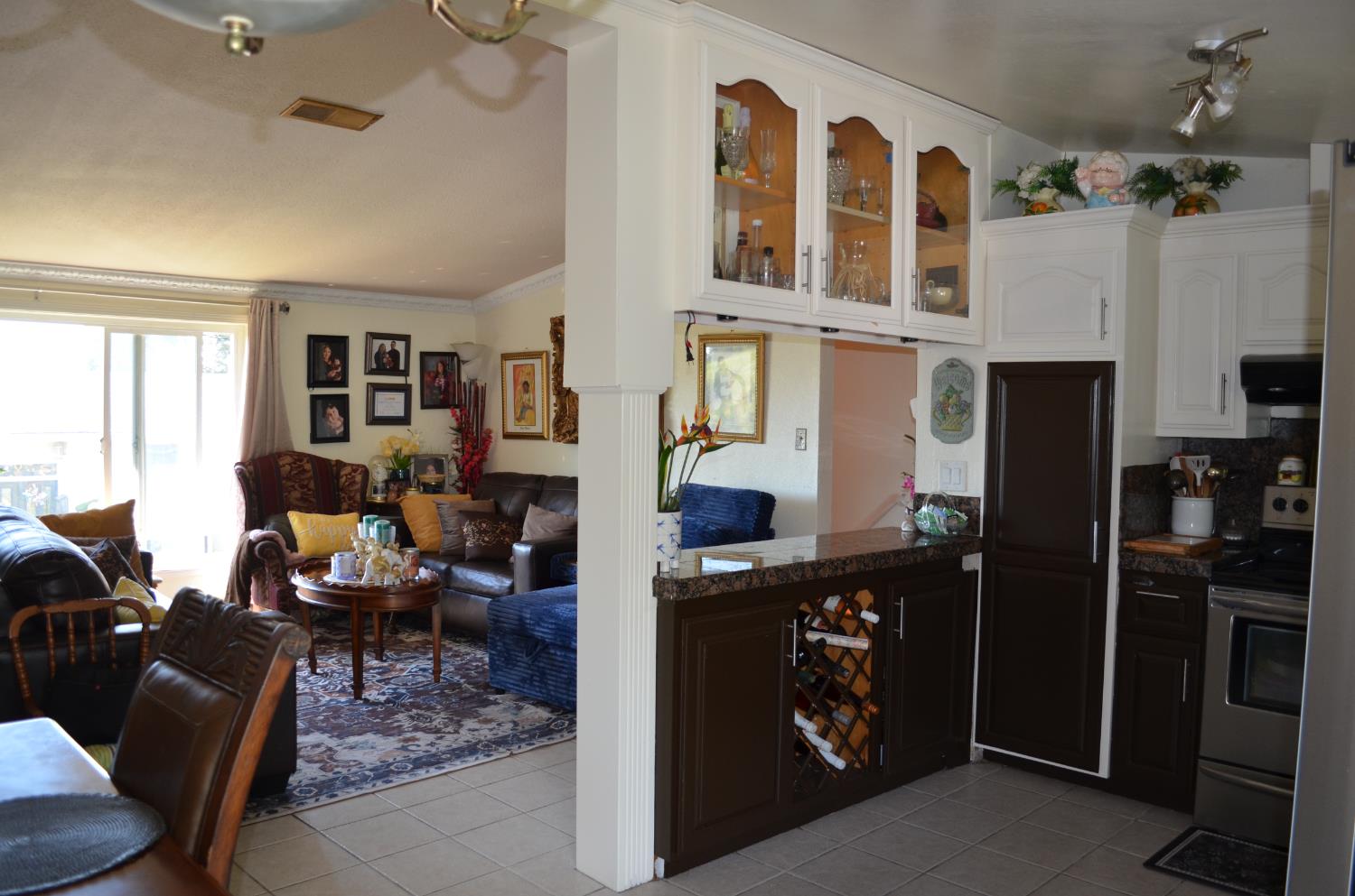 208 Appian Way Union City, CA 94587 - Photo 23 of 38 a living room with furniture a fireplace and a window