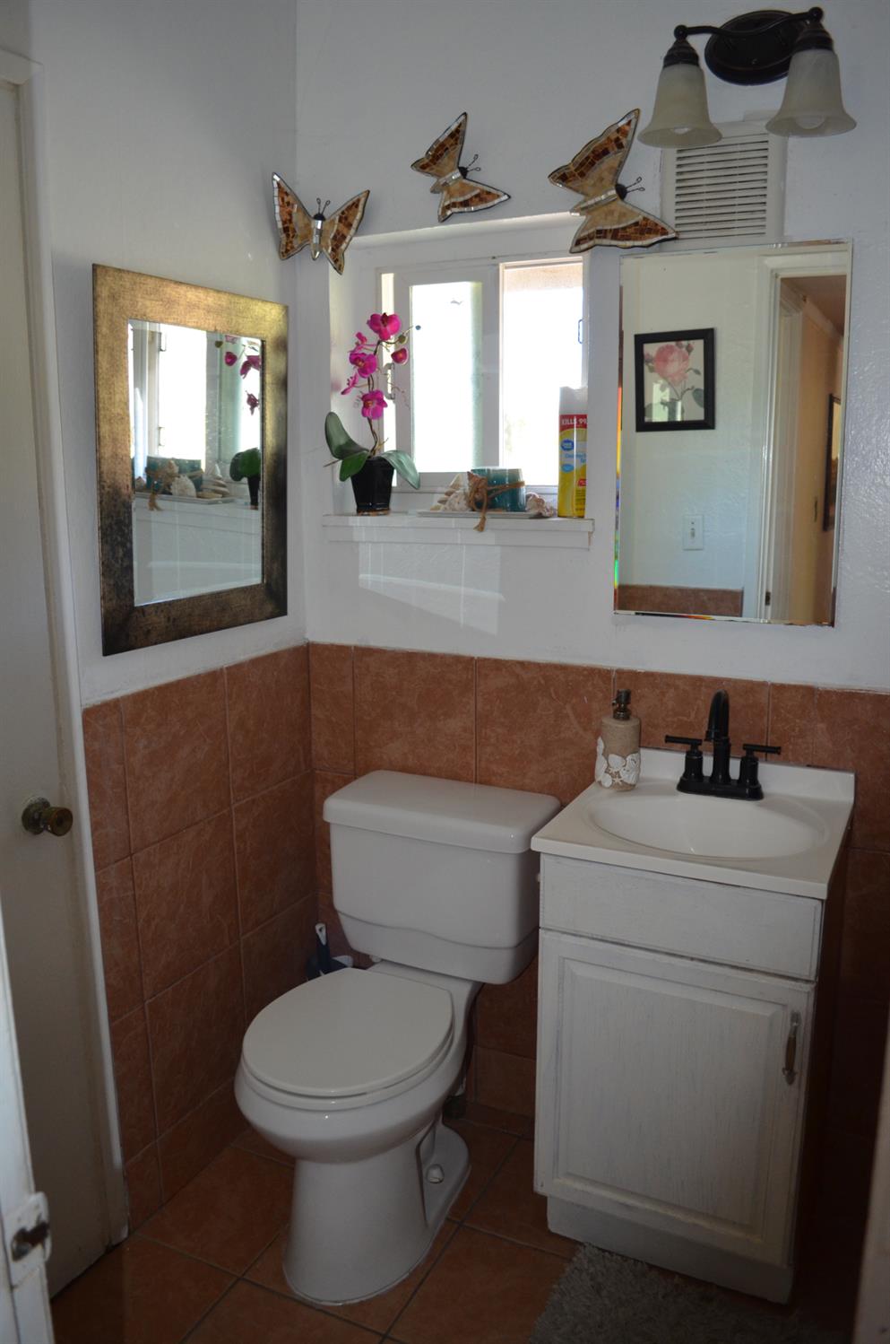 208 Appian Way Union City, CA 94587 - Photo 30 of 38 a bathroom with a toilet sink and mirror