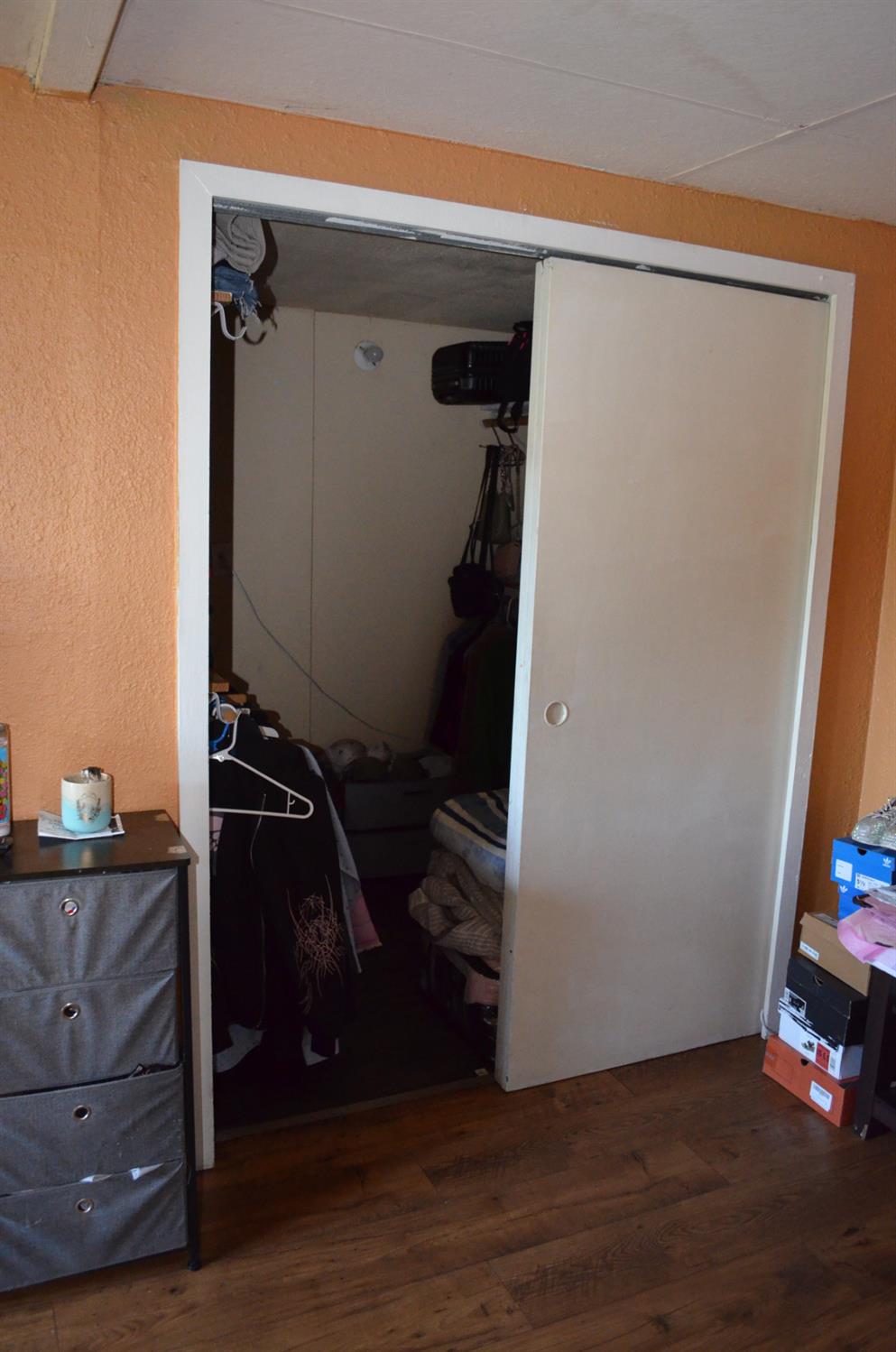 208 Appian Way Union City, CA 94587 - Photo 37 of 38 a view of walk in closet with clothes and shoes