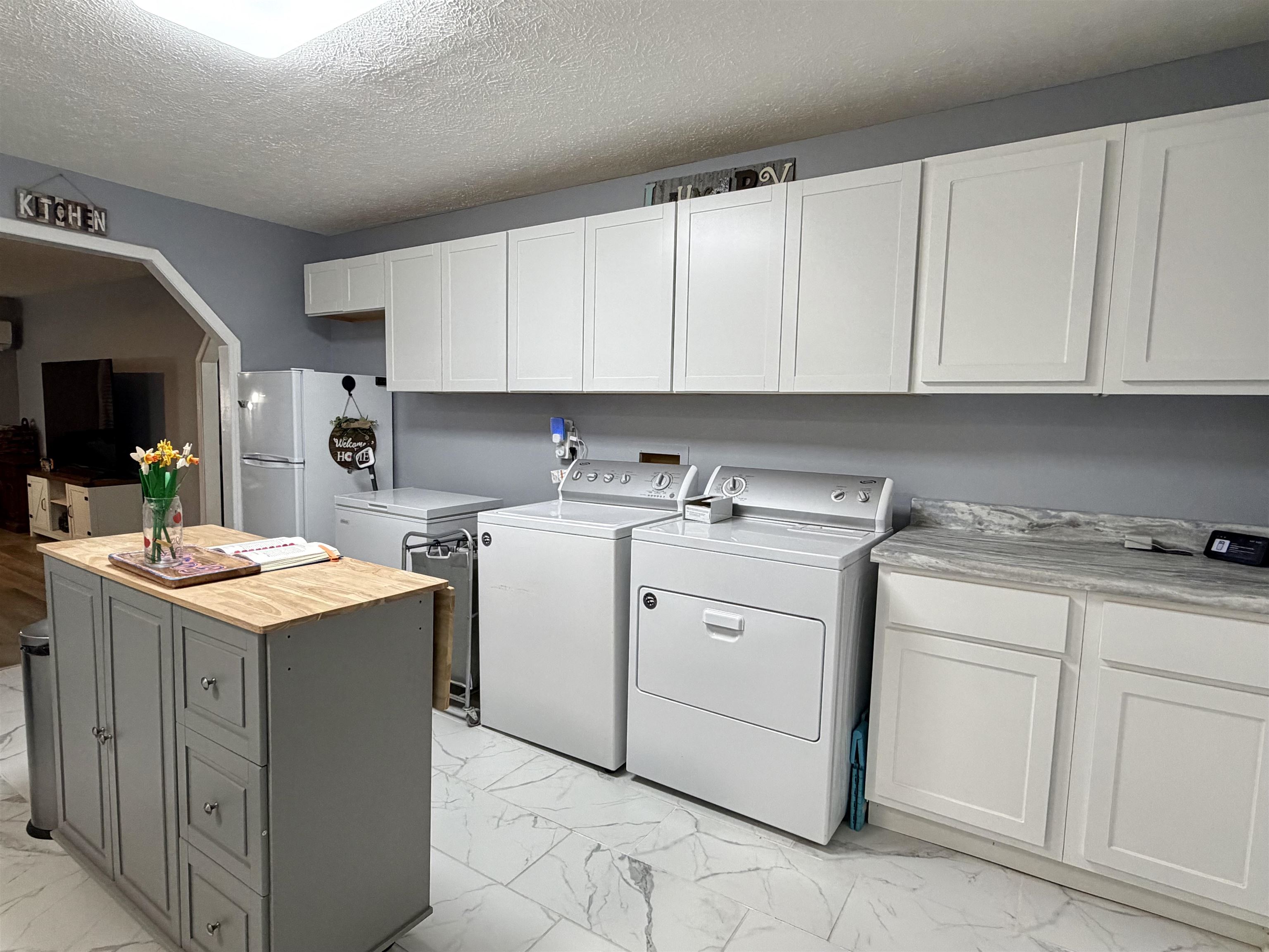 8022 45th Highway Ramer, TN 38367 - Photo 7 of 20 a kitchen with cabinets appliances a sink and a counter top space