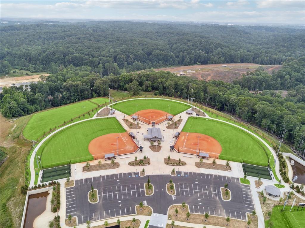 2546 Harbor Ridge Pass, Unit 341 Gainesville, GA 30507 - Photo 34 of 41 an aerial view of a house with a garden and pool