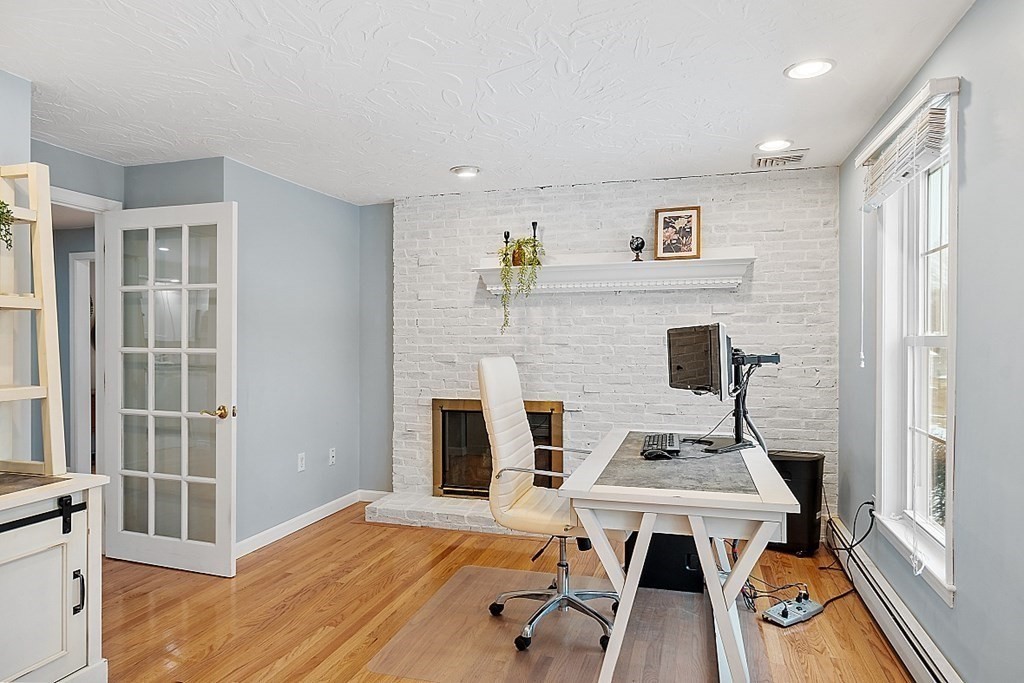 7 Gavin Circle Andover, MA 01810 - Photo 13 of 42 a view of a workspace with furniture and a window