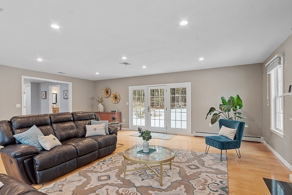 7 Gavin Circle Andover, MA 01810 - Photo 18 of 42 a living room with furniture and wooden floor