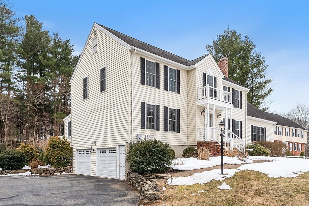 7 Gavin Circle Andover, MA 01810 - Photo 2 of 42 a front view of a house with a yard