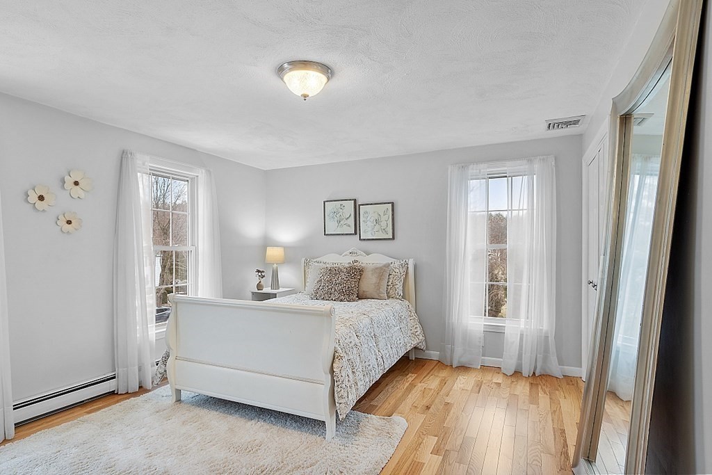 7 Gavin Circle Andover, MA 01810 - Photo 23 of 42 a bedroom with a bed and a window