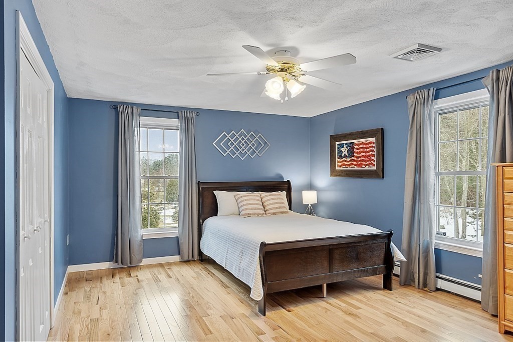 7 Gavin Circle Andover, MA 01810 - Photo 25 of 42 a bedroom with a large bed and a window