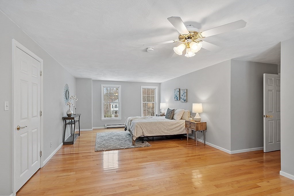 7 Gavin Circle Andover, MA 01810 - Photo 29 of 42 a living room with furniture and wooden floor