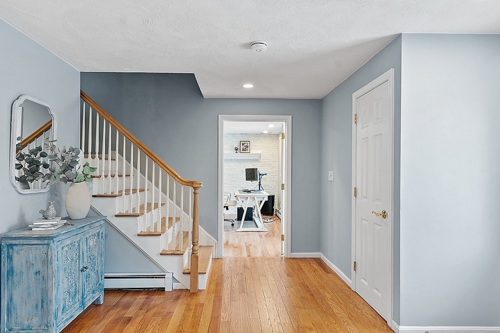 7 Gavin Circle Andover, MA 01810 - Photo 4 of 42 a view of entryway and hall with wooden floor