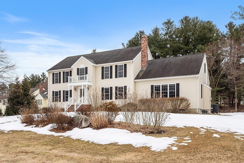 7 Gavin Circle Andover, MA 01810 - Photo 42 of 42 a view of a house with a yard covered in snow