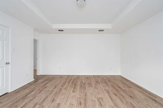 a view of small space with wooden floor