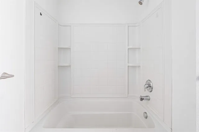 a close up of a bathtub