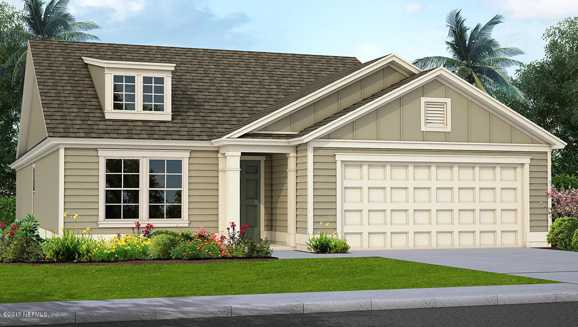 499 Deer Crossing Road St. Augustine, FL 32086 - Photo 1 of 5 a front view of a house with a yard and garage