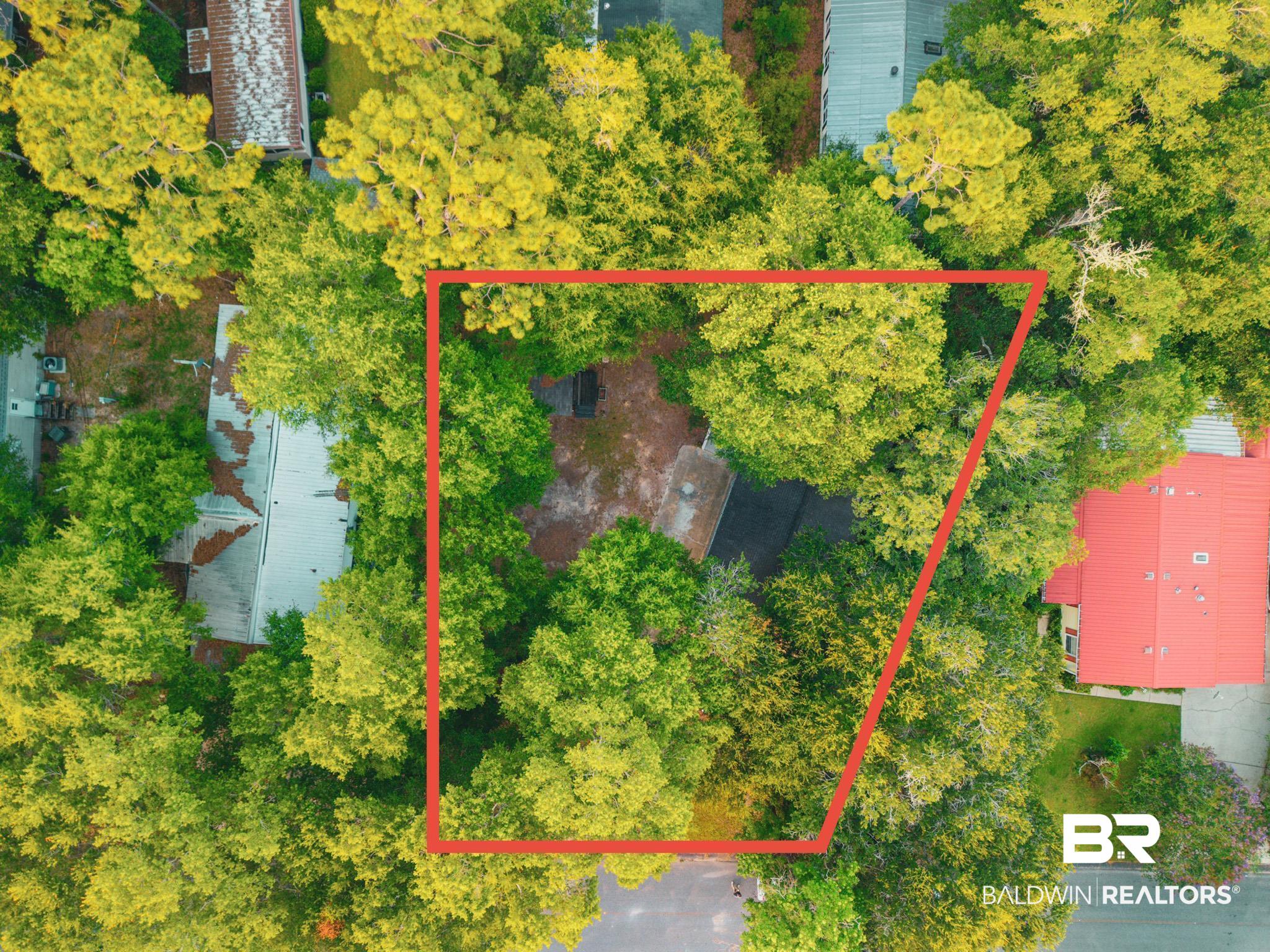1563 Valencia Drive Lillian, AL 36549 - Photo 24 of 27 Aerial view of property and surrounding area featuring property parcel outlined