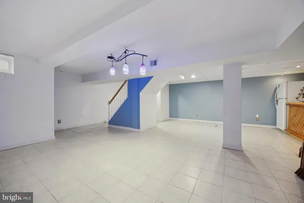 a view of a hallway with staircase