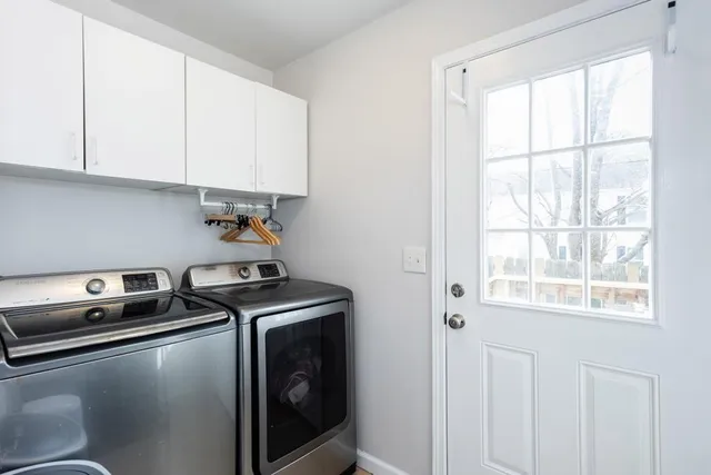 a bathroom with a sink a mirror and vanity