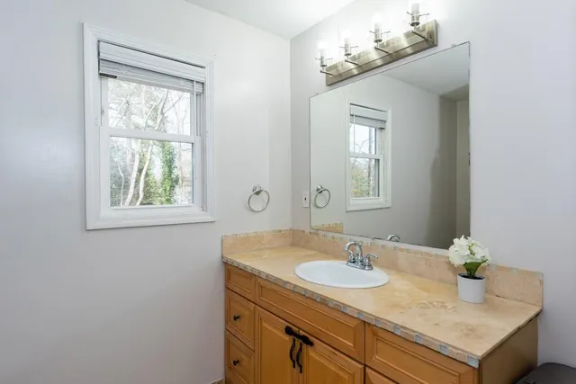 a view of bathroom with bathtub and shower