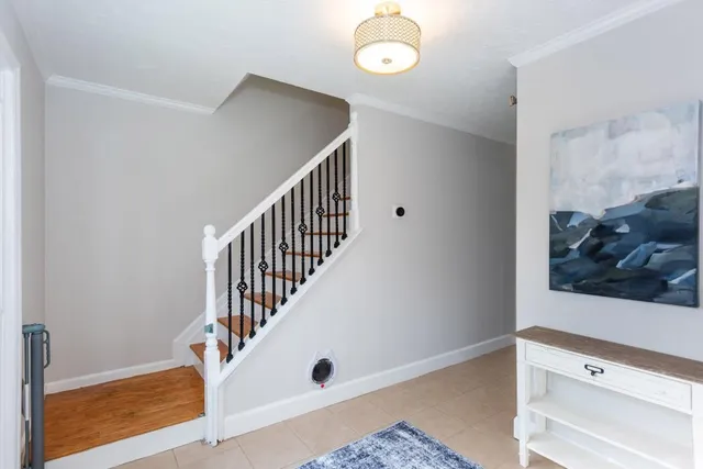 a view of entryway with wooden floor