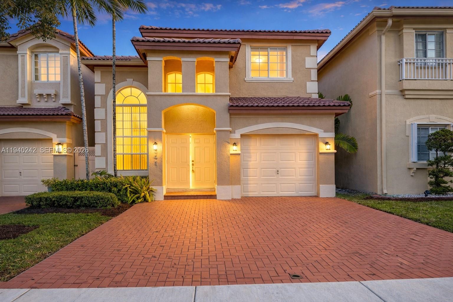 11541 Northwest 68th Terrace Doral, FL 33178 - Photo 1 of 18 doral home in gated community