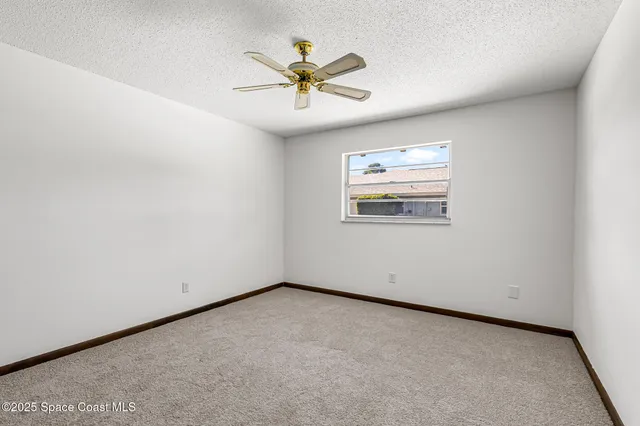 a view of backyard with green space