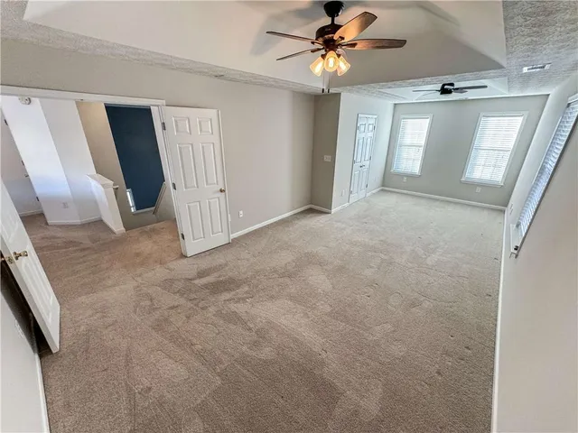 a view of a livingroom with a staircase