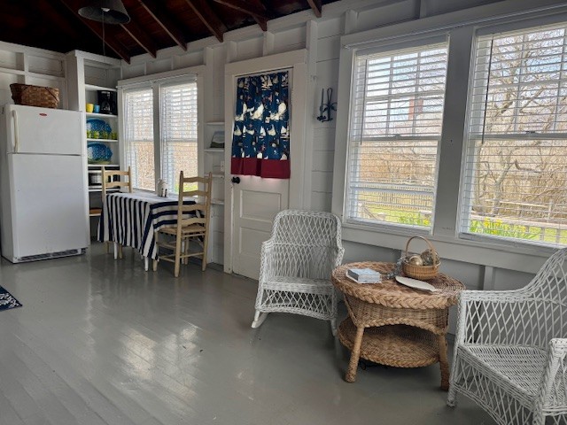 24 Washington Avenue Nantucket, MA 02554 - Photo 3 of 9 a living room with furniture and a window