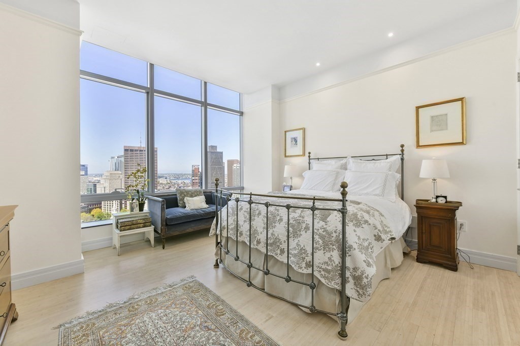 1 Avery Street, Unit PH1A Boston, MA 02111 - Photo 19 of 29 a living room with furniture and a large window