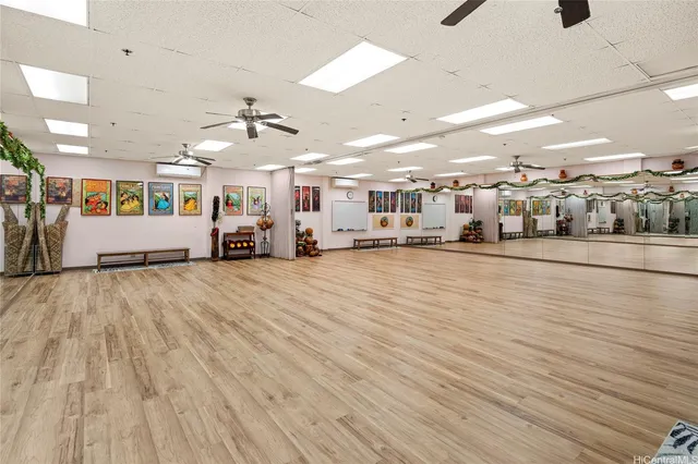 a view of a room with workspace and toys