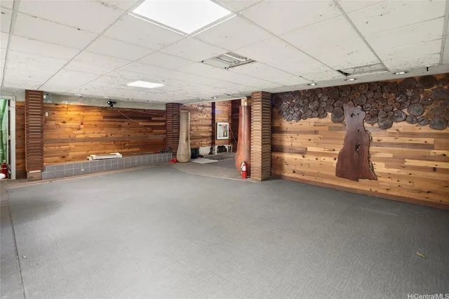 a view of an empty room with a fireplace