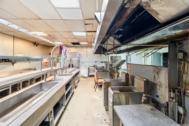 a view of a kitchen with furniture and a kitchen