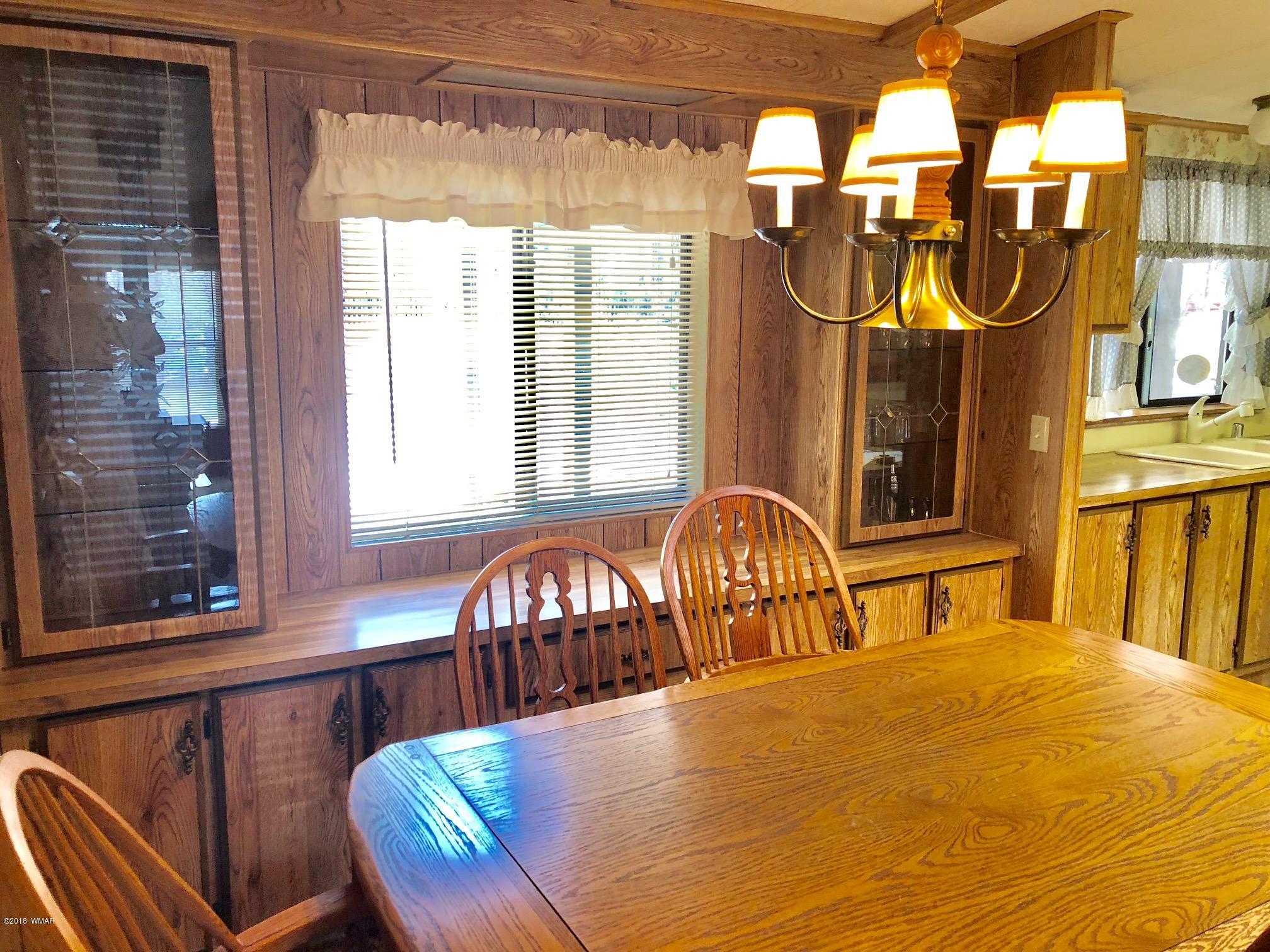 4288 Racoon Court Pinetop, AZ 85935 - Photo 11 of 29 a view of a chairs and table in the balcony