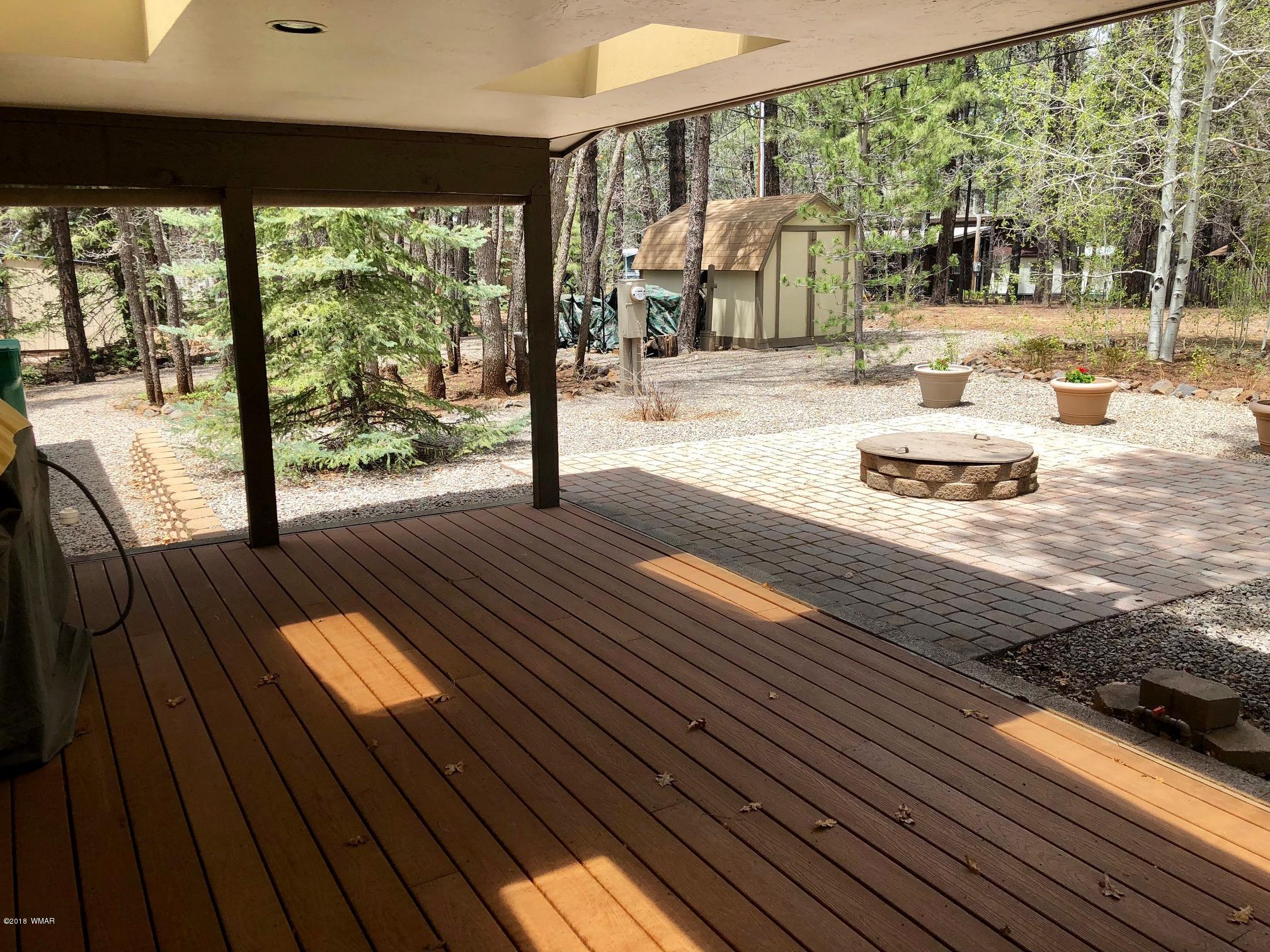 4288 Racoon Court Pinetop, AZ 85935 - Photo 20 of 29 a view of a balcony with wooden floor