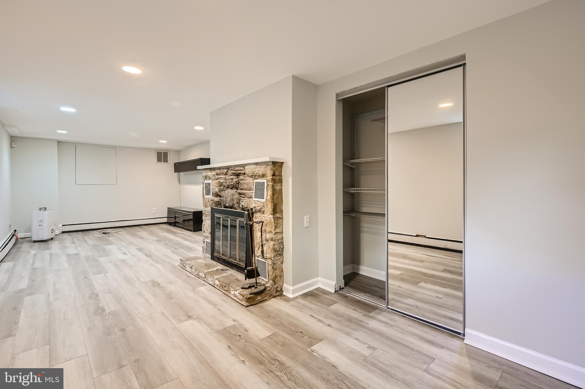 23 Greenspring Valley Road Owings Mills, MD 21117 - Photo 20 of 28 an empty room with wooden floor closet and windows