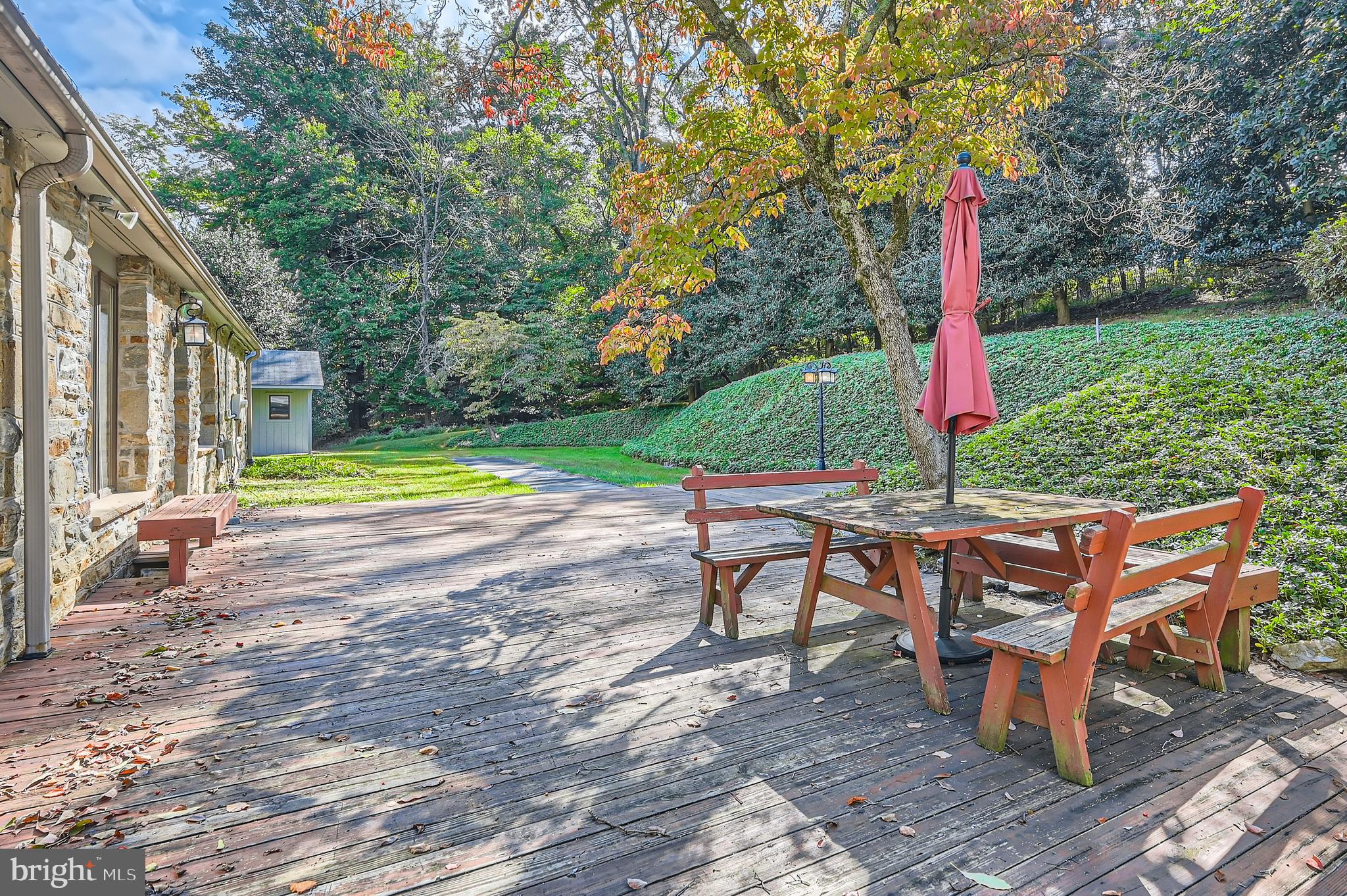 23 Greenspring Valley Road Owings Mills, MD 21117 - Photo 23 of 28 a view of a sitting area with swimming pool and sitting area