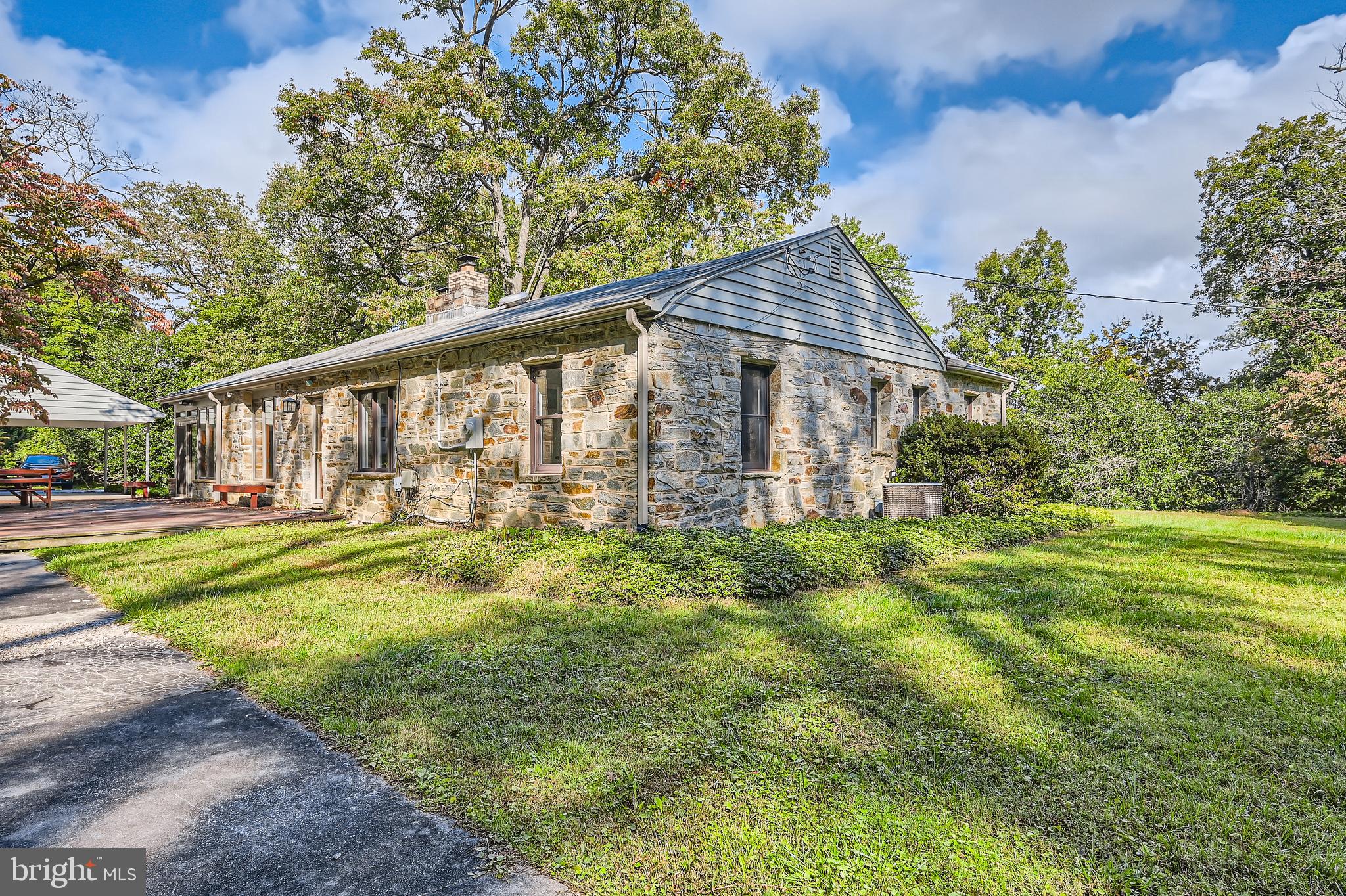 23 Greenspring Valley Road Owings Mills, MD 21117 - Photo 25 of 28 a view of a house with a big yard and large trees