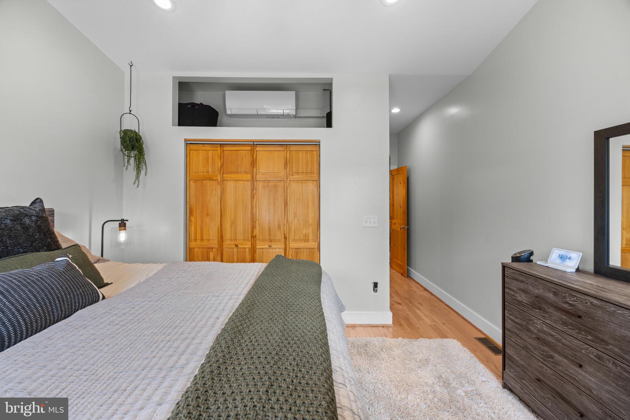 3208 Elliott Street Baltimore, MD 21224 - Photo 25 of 42 a bedroom with a bed and a window