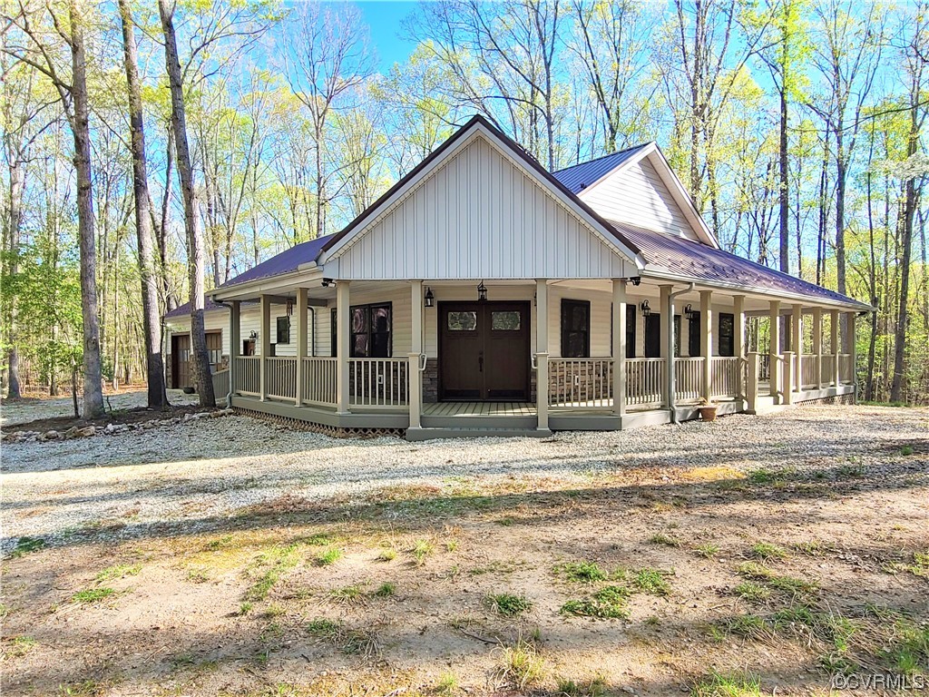 232 Perkins Mill Road Dillwyn, VA 23936 - Photo 1 of 48 a house with trees in the background