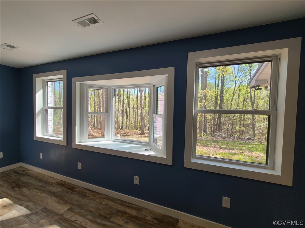 232 Perkins Mill Road Dillwyn, VA 23936 - Photo 18 of 48 a bedroom with a bed and a window