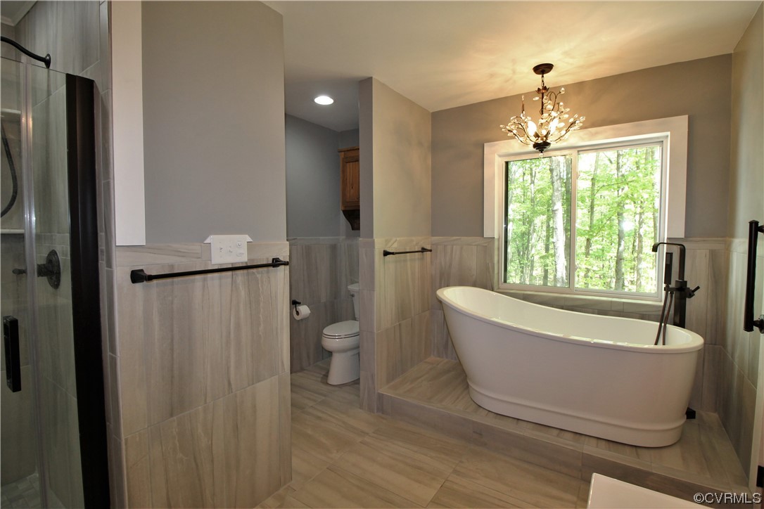 232 Perkins Mill Road Dillwyn, VA 23936 - Photo 21 of 48 a bathroom with a bathtub and shower