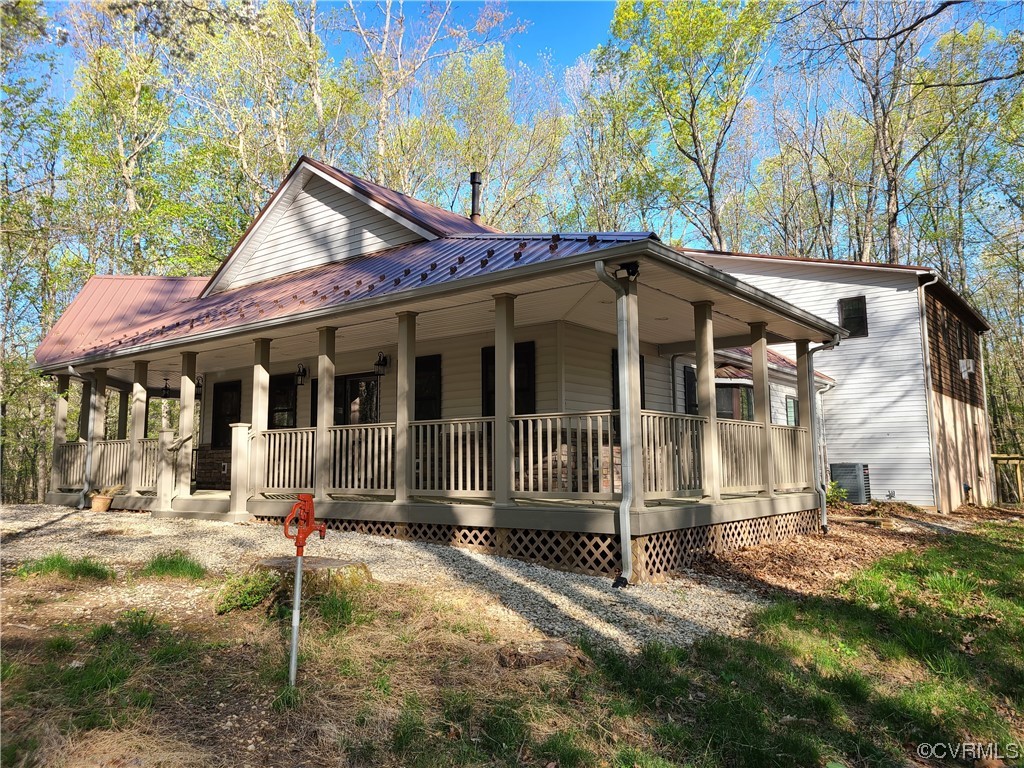 232 Perkins Mill Road Dillwyn, VA 23936 - Photo 3 of 48 a front view of a house with a yard