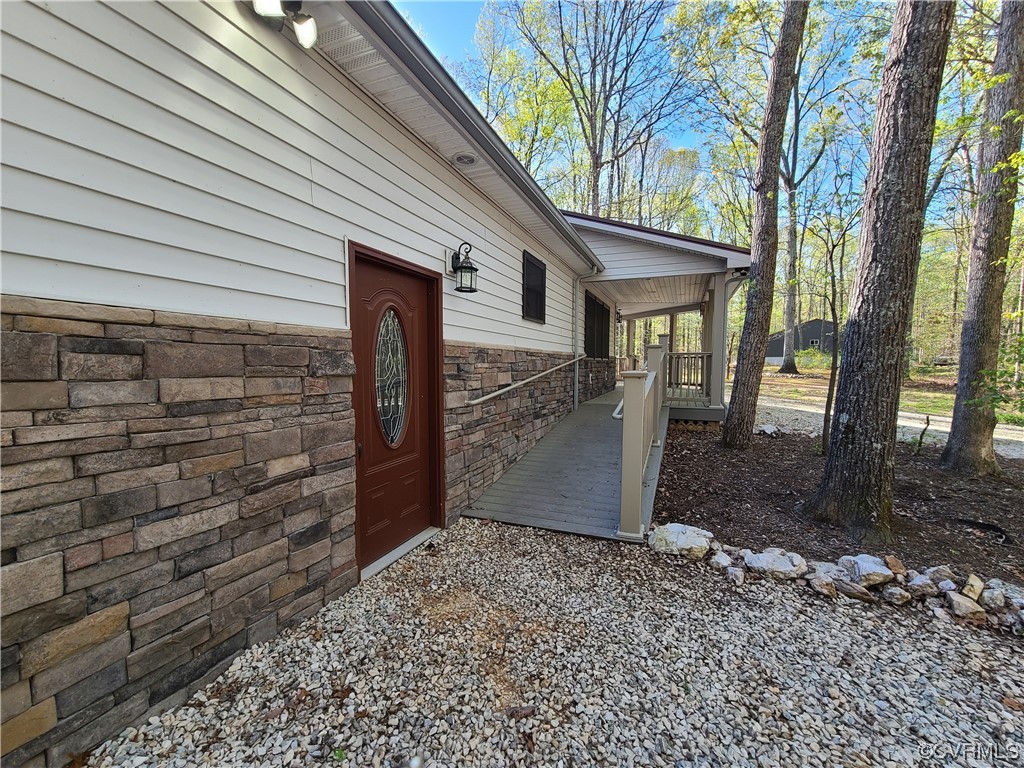 232 Perkins Mill Road Dillwyn, VA 23936 - Photo 5 of 48 a view of a house with a yard