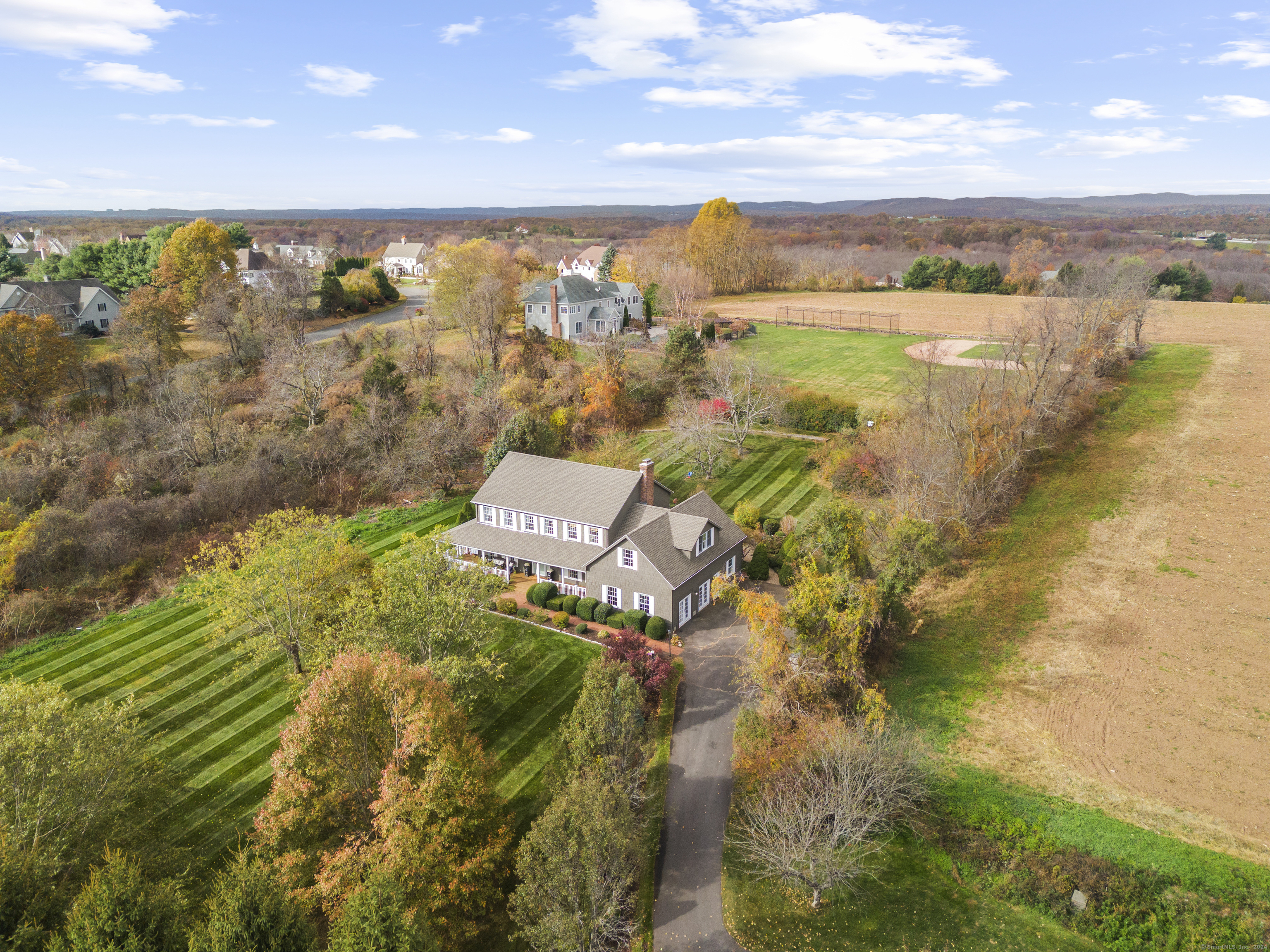 9 South Branford Road Wallingford, CT 06492 - Photo 1 of 1 a view of a lake with a mountain