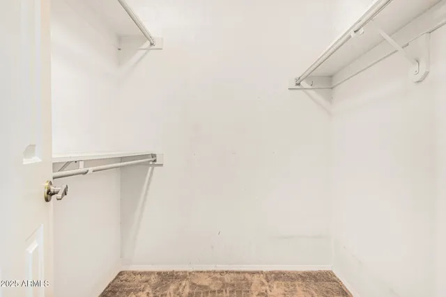 a bathroom with a sink toilet vanity and shower